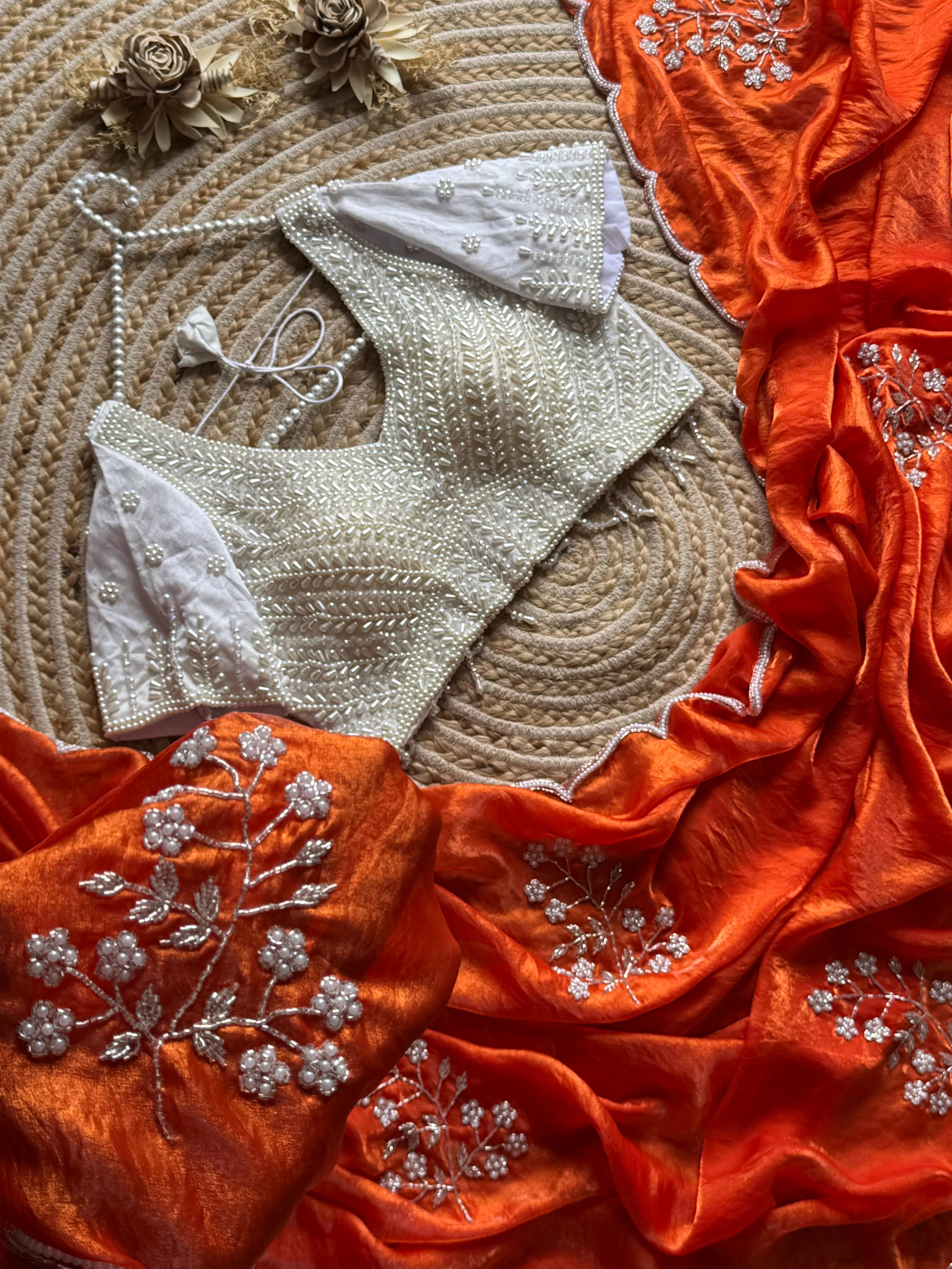 Space silk designer saree with pearl blouse